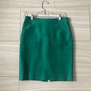 Emerald green pencil skirt.